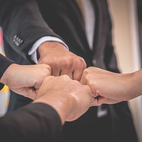 Unifund Mission Group team fist