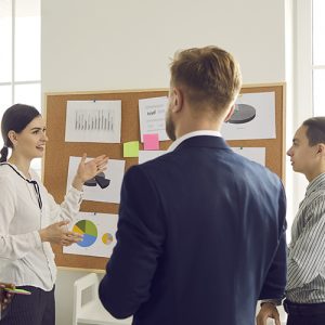 Female manager explaining graph to a newly appointed employee