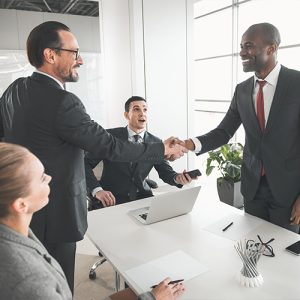 Business professionals handshake